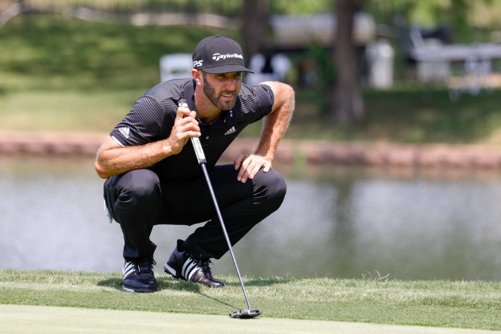IRVING TX MAY 20 Dustin Johnson lines up his putt on 14 during the third round of the AT&T Byron